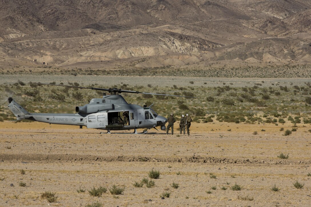 U.S. Marine Corps Col. Thomas E. Prentice, commanding officer, 23rd Marine Regiment, 4th Marine Division, Marine Forces Reserve, prepares to board a UH-1Y Huey belonging to Marine Light Attack Helicopter Squadron 773, Marine Aircraft Group 49, 4th Marine Aircraft Wing, MARFORRES, to conduct reconnaissance of the training area at Marine Air Ground Combat Center Twentynine Palms, California during Integrated Training Exercise 4-17, June 20, 2017. The scouting mission was in preparation of the 25th Marine Regiment final battalion exercise during ITX 4-17. (U.S. Marine Corps photo by Imari J. Dubose)