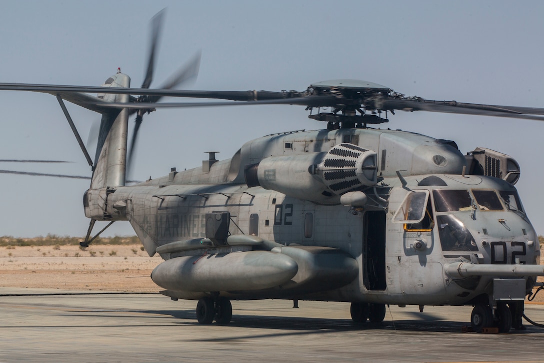 A CH-53E Super Stallion belonging to Marine Heavy Helicopter Squadron 772, Marine Aircraft Group 49, 4th Marine Aircraft Wing, Marine Forces Reserve, receives fuel on an airstrip at Camp Wilson, Marine Air Ground Combat Center Twentynine Palms, California, June 21, 2017. The squadron prepared for night missions in support of the 2nd Battalion, 25th Marine Regiment, 4th Marine Division, MARFORRES, final battalion exercise of Integrated Training Exercise 4-17.  (U.S. Marine Corps photo by Imari J. Dubose)