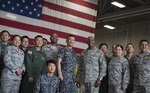 Warrant Officer Katsumi Yamazaki, senior enlisted advisor of the Japan Air Self-Defense Force and Chief Master Sgt. of the Air Force Kaleth O. Wright pose for a group photo at Joint Base Elmendorf-Richardson’s Hangar 4, June 19, 2017. The chief master sergeant of the Air Force, the Japan Air Self-Defense Force senior enlisted advisor, and other senior enlisted leaders visited Joint Base Elmendorf-Richardson, Alaska, as part of an international key-leader engagement.