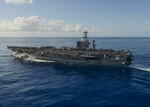 The aircraft carrier USS Nimitz (CVN 68) transits the Pacific Ocean. The ship is on a scheduled deployment to the western Pacific and Indian Oceans, June 17, 2017. 