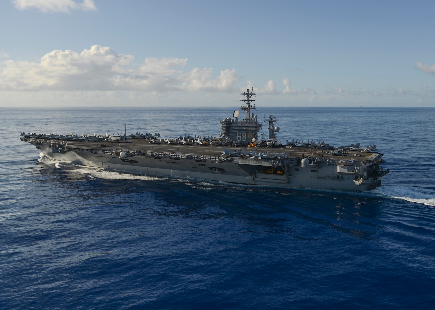 The aircraft carrier USS Nimitz (CVN 68) transits the Pacific Ocean. The ship is on a scheduled deployment to the western Pacific and Indian Oceans, June 17, 2017. 