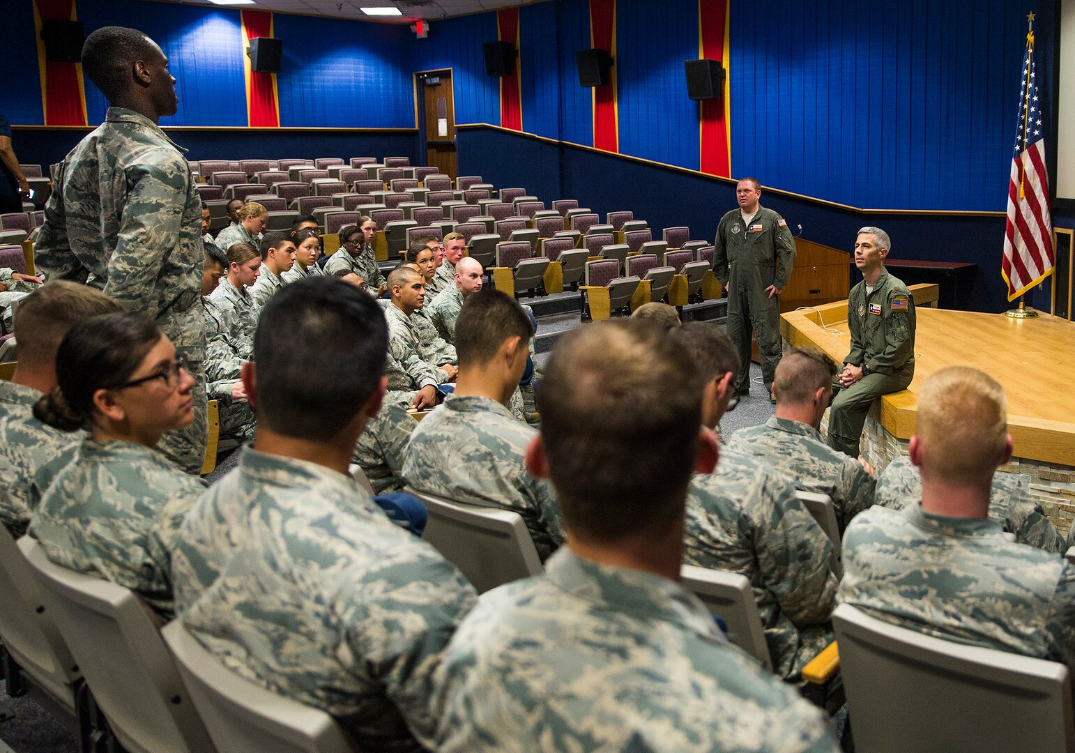 Maj. Matthew Menendez, 68th Airlift Squadron pilot, takes question from Air Force Academy cadets during their visit of the 433rd Airlift Wing June 21, 2017 at Joint Base San Antonio-Lackland, Texas. The third-year cadets are visiting operational units throughout the U.S.to get a better understanding of the different careers available in the Air Force. (U.S. Air Force photo by Benjamin Faske)