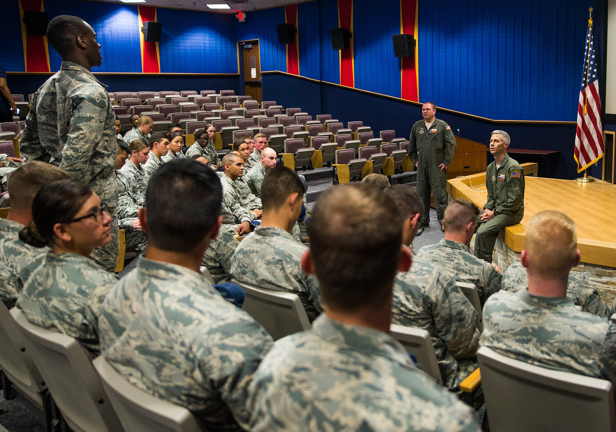 Maj. Matthew Menendez, 68th Airlift Squadron pilot, takes question from Air Force Academy cadets during their visit of the 433rd Airlift Wing June 21, 2017 at Joint Base San Antonio-Lackland, Texas. The third-year cadets are visiting operational units throughout the U.S.to get a better understanding of the different careers available in the Air Force. (U.S. Air Force photo by Benjamin Faske)