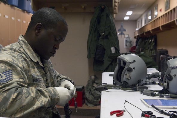 U.S. Air Force Technical Sgt. Warren Binyard, the 36th Fighter Squadron noncommissioned officer in charge of aircrew flight equipment, disassembles parts of an oxygen mask June 21, 2017, at Eielson Air Force Base, Alaska. The equipment that Binyard maintains is essential to pilots due to the high altitude at which they fly. (U.S. Air Force photo by Airman Eric M. Fisher)