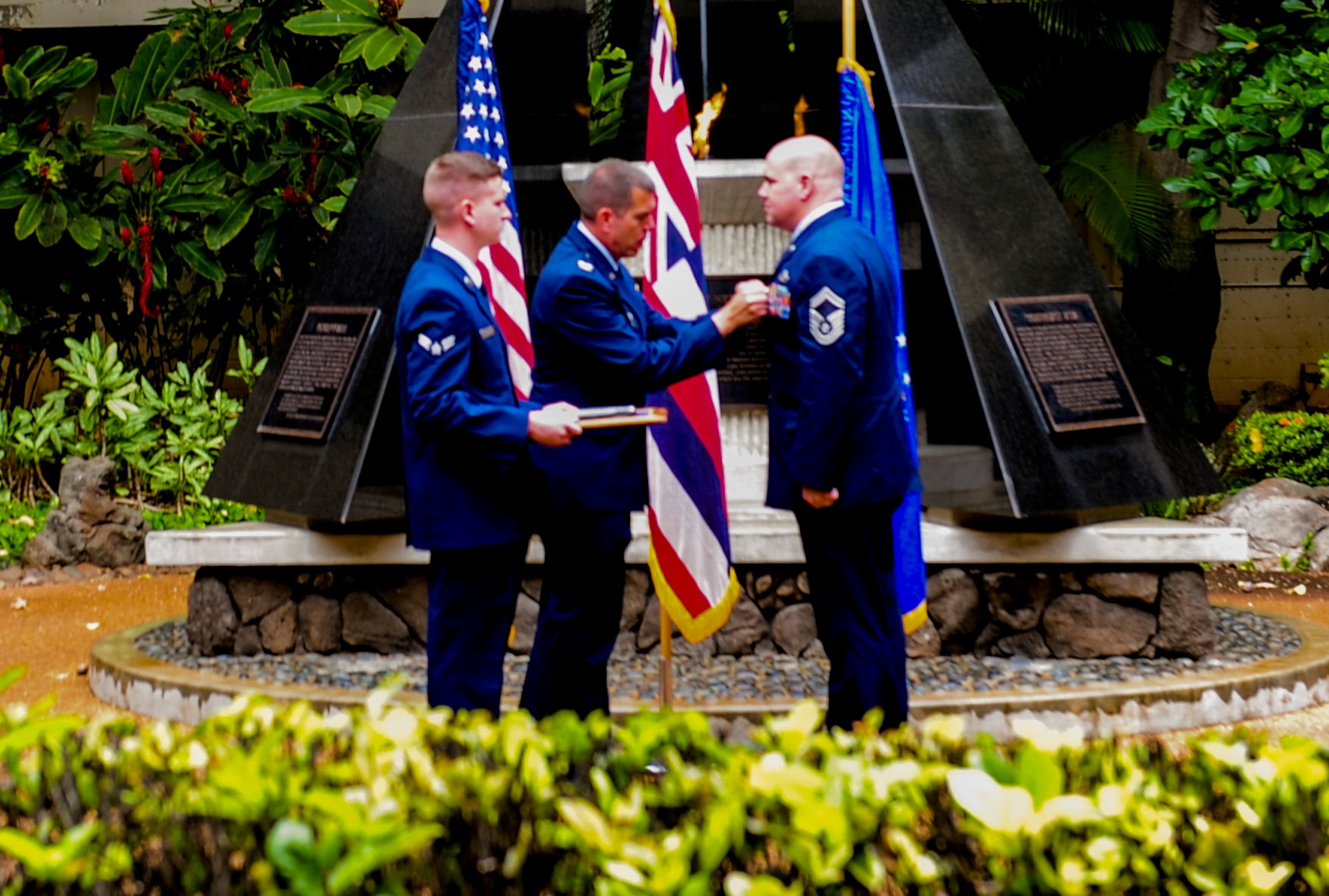 Col. Steven Dickerson, 557th Weather Wing commander, presents Senior Master Sgt. Jason L. Ronsse, 17th Operational Weather Squadron superintendent, with a Purple Heart Medal at the Hall of Heroes, on Joint Base Pearl Harbor-Hickam, Hawaii, June 20, 2017. Ronsse received numerous injuries in Dec. 2013 during his deployment in Bagram, Afghanistan in support of Operation Enduring Freedom. (U.S. Air Force photo by Airman 1st Class Jacoya Scandrick)
