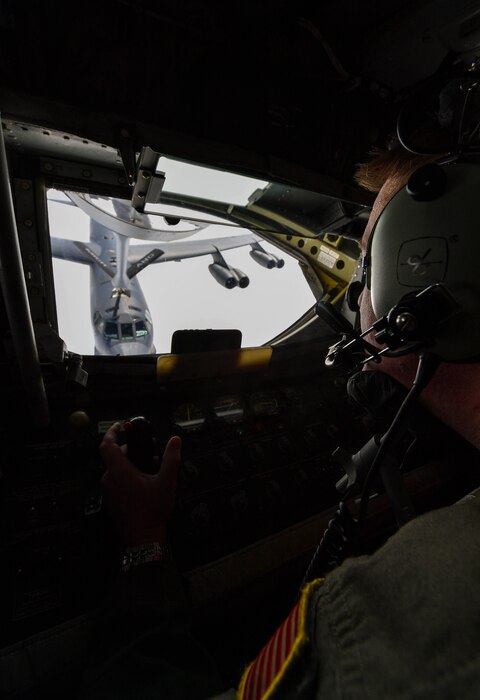 U.S. Air National Guard Tech. Sgt. Max Langford, 171st Air Refueling Squadron boom operator, refuels a U.S. Air Force Global Strike Command B-52 Stratofortress during exercise Saber Strike 17 above Riga, Latvia, June 13, 2017. Langford, along with other boom operators from the 171st ARS, refueled B-52s and B-1B Lancers throughout the exercise. The combined training opportunities that Saber Strike 17 provides greatly improves interoperability among participating NATO Allies and key regional partners. (U.S Air Force photo by Senior Airman Tryphena Mayhugh)