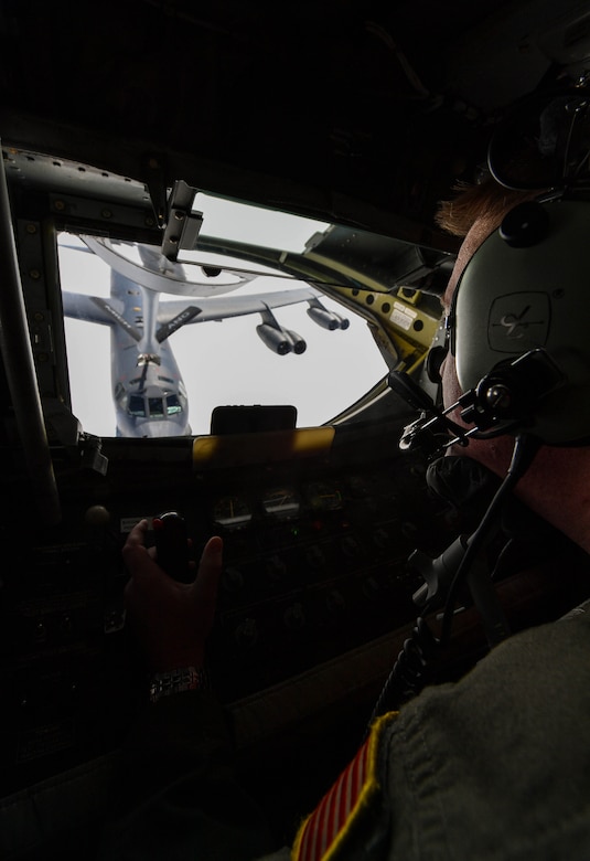 U.S. Air National Guard Tech. Sgt. Max Langford, 171st Air Refueling Squadron boom operator, refuels a U.S. Air Force Global Strike Command B-52 Stratofortress during exercise Saber Strike 17 above Riga, Latvia, June 13, 2017. Langford, along with other boom operators from the 171st ARS, refueled B-52s and B-1B Lancers throughout the exercise. The combined training opportunities that Saber Strike 17 provides greatly improves interoperability among participating NATO Allies and key regional partners. (U.S Air Force photo by Senior Airman Tryphena Mayhugh)