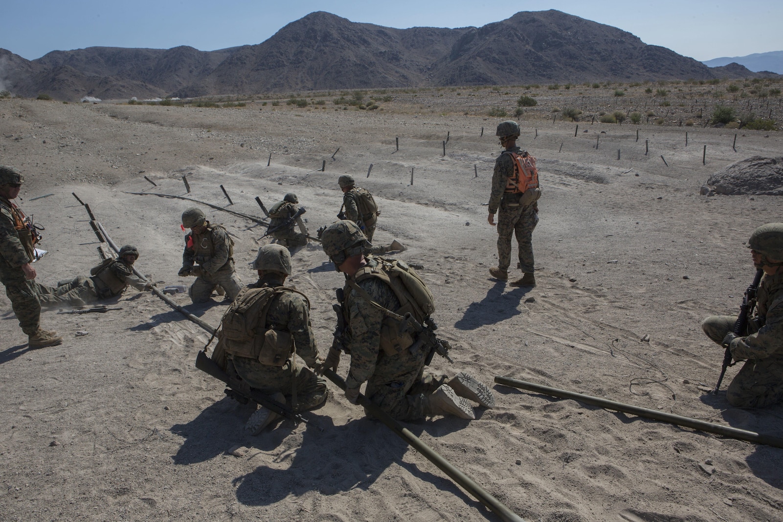 U.S. Marines with Golf Company, 2nd Battalion, 25th Marines, 4th Marine Division, Marine Forces Reserve, engineer a bangalore torpedo on range 400 as part of Integrated Training Exercise 4-17 at Camp Wilson, Twentynine Palms, California on June 18, 2017. ITX 4-17 is a live-fire and maneuver combined arms exercise designed to train battalion and squadron-sized units in the tactics, techniques, and procedures required to provide a sustainable and ready operational reserve for employment across the full spectrum of crisis and global engagement.