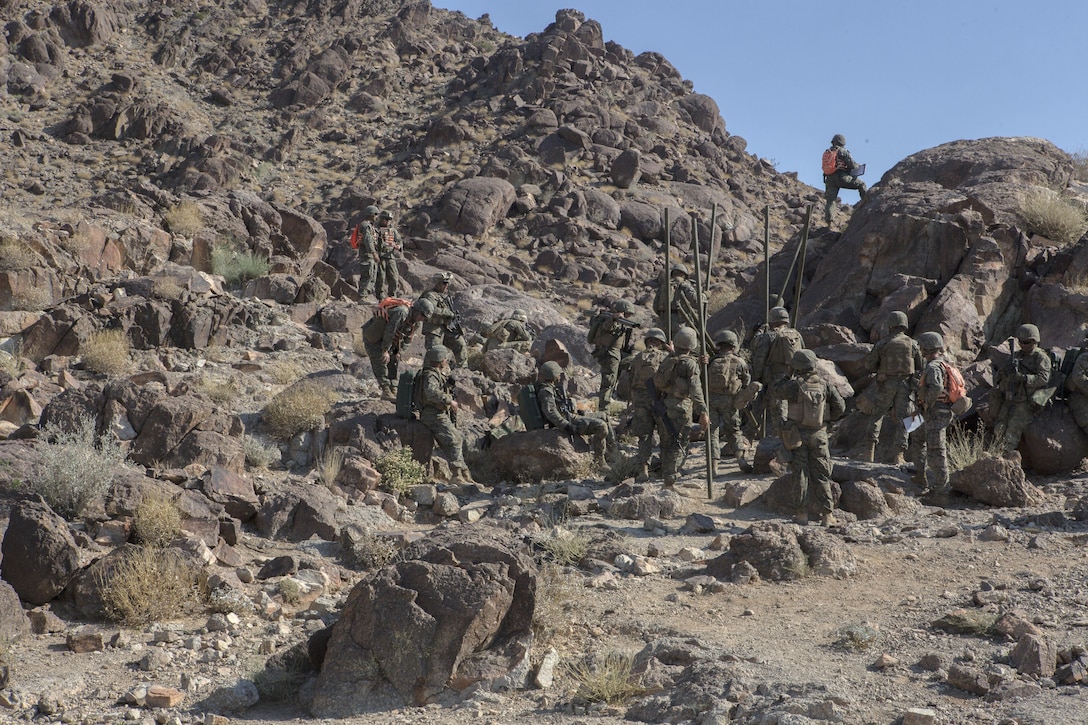 U.S. Marines with Golf Company, 2nd Battalion, 25th Marines, 4th Marine Division, Marine Forces Reserve, prepare to breach on range 400 as part of Integrated Training Exercise 4-17 at Camp Wilson, Twentynine Palms, California, on June 18, 2017. ITX 4-17 is a live-fire and maneuver combined arms exercise designed to train battalion and squadron-sized units in the tactics, techniques, and procedures required to provide a sustainable and ready operational reserve for employment across the full spectrum of crisis and global engagement.