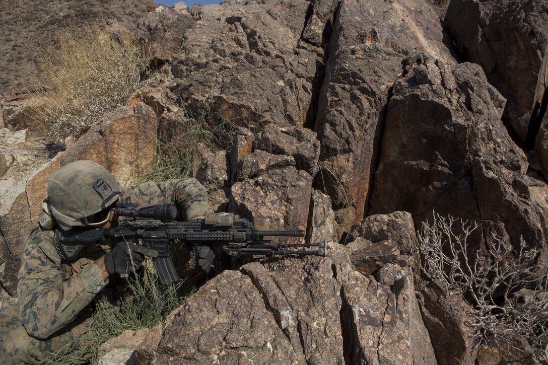 A U.S. Marine with Golf Company, 2nd Battalion, 25th Marines, 4th Marine Division, Marine Forces Reserve, fire on range 400 as part of Integrated Training Exercise 4-17 at Camp Wilson, Twentynine Palms, California on June 18, 2017. ITX 4-17 is a live-fire and maneuver combined arms exercise designed to train battalion and squadron-sized units in the tactics, techniques, and procedures required to provide a sustainable and ready operational reserve for employment across the full spectrum of crisis and global engagement.