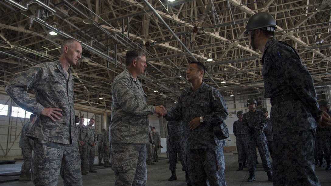 U.S. Air Force Col. Robert Grainger, left, 18th Civil Engineer Group commander at Kadena Air Base, Japan, and Col. Douglas Gilpin, left center, Fifth Air Force logistics, engineering and force protection director at Yokota Air Base, Japan, meets with Japan Air Self-Defense Force civil engineer leadership, right, during a bilateral exchange event at Misawa Air Base, Japan, June 22, 2017. Grainger and Gilpin joined JASDF leadership to share each other’s expertise and experiences with both the JASDF and U.S. Air Force junior Airmen. (U.S. Air Force photo by Senior Airman Deana Heitzman)