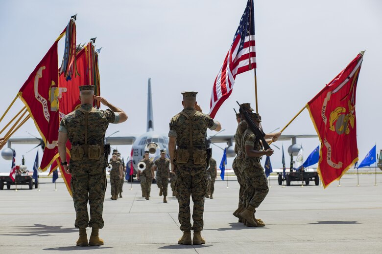 U.S. Marine Corps Col. Daniel Shipley, left, former Marine Aircraft Group (MAG) 12 commanding officer, and U.S. Marine Corps Col. Mark Palmer, right, MAG-12 commanding officer, pay their respects to colors during a change of command ceremony at Marine Corps Air Station Iwakuni, Japan, June 23, 2017. After two years of dedicated service to MAG-12, Shipley was relieved of his duties by Palmer. (U.S. Marine Corps photo by Lance Cpl. Joseph Abrego)