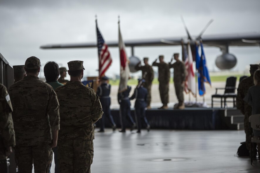 U.S. Air Force Lt. Gen. Brad Webb, commander of Air Force Special Operations Command, U.S. Air Force Col. William Freeman, outgoing commander of the 353rd Special Operations Group and U.S. Air Force Col. Jason Kirby, incoming commander of the 353rd SOG, salute the colors during the 353rd SOG change of command ceremony, June 19, 2017 at Kadena Air Base, Japan. Webb was the presiding official of the ceremony. (U.S. Air Force photo by Capt. Jessica Tait)