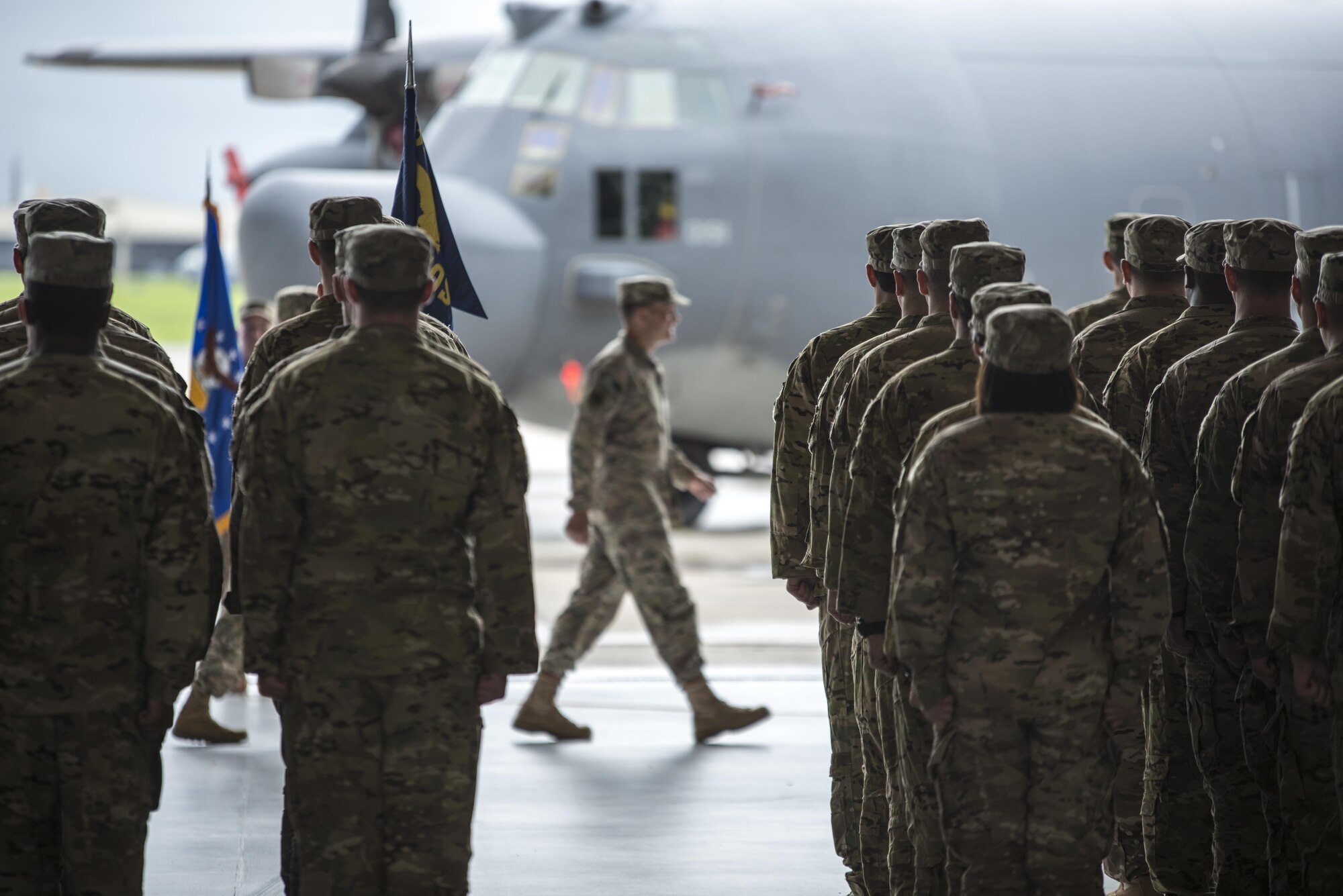 U.S. Air Force Col. Jason Kirby, commander of the 353rd Special Operations Group, walks off the stage following conclusion of the 353rd SOG change of command ceremony, June 19, 2017 at Kadena Air Base, Japan. Kirby now commands more than 850 Airmen who make up the only Air Force special operations unit in the Pacific. (U.S. Air Force photo by Capt. Jessica Tait)