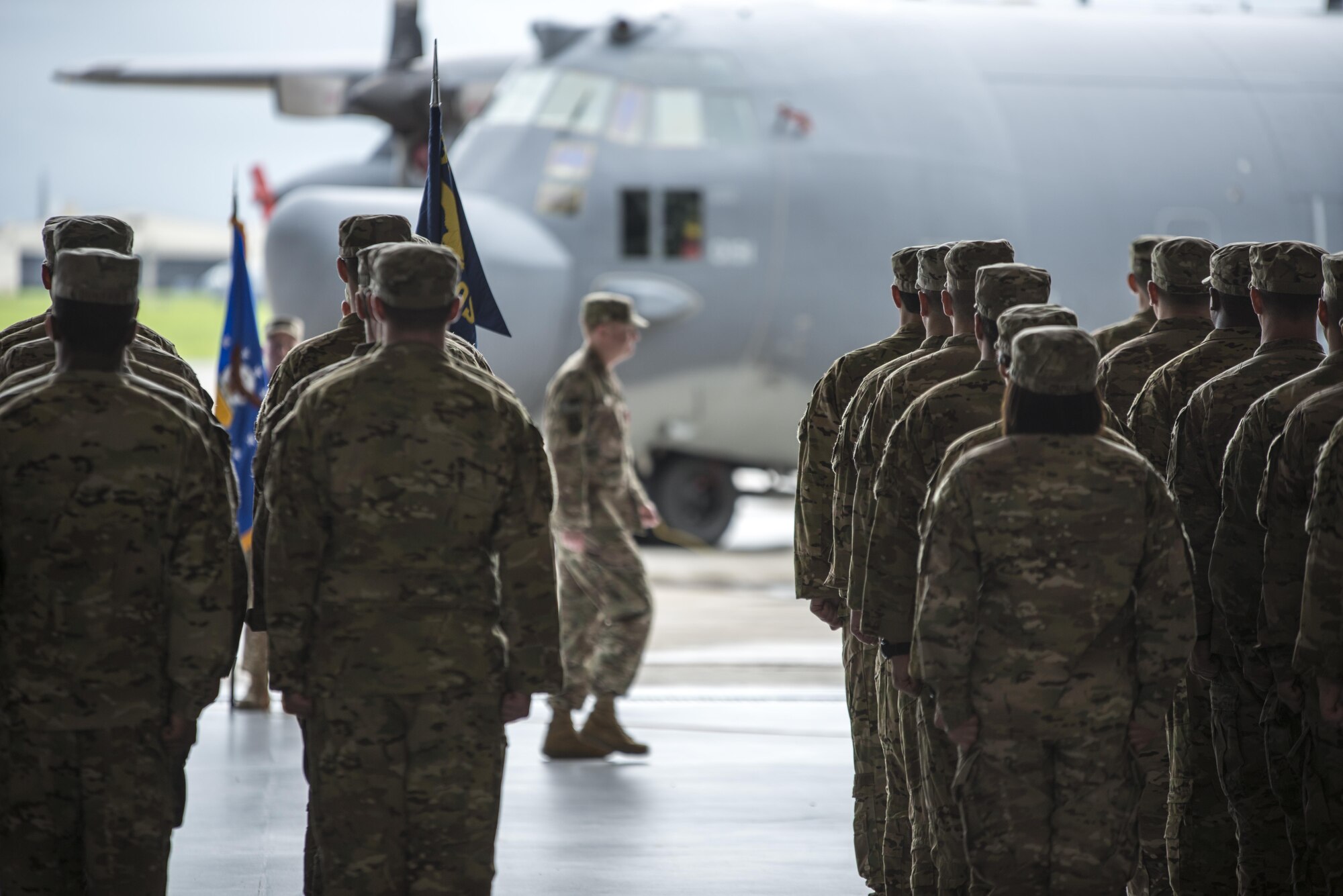 U.S. Air Force Col. William Freeman, outgoing commander of the 353rd Special Operations Group, walks off the stage following conclusion of the 353rd SOG change of command ceremony, June 19, 2017 at Kadena Air Base, Japan. Freeman leaves Kadena for an assignment at AFSOC Headquarters at Hurlburt Field, Fla. (U.S. Air Force photo by Capt. Jessica Tait)