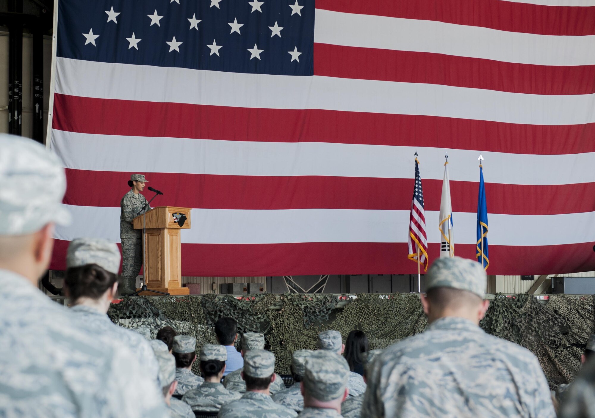 U.S. Air Force Col. Joann V. Palmer, 8th Medical Group commander, speaks to the 8th Fighter Wing during a change of command ceremony at Kunsan Air Base, Republic of Korea, June 23, 2017. Palmer took command of the 8th MDG from Col. Lisa A. Davison and upon assuming the position, received the title of “Hawk.” (U.S. Air Force photo by Senior Airman Colville McFee/Released)