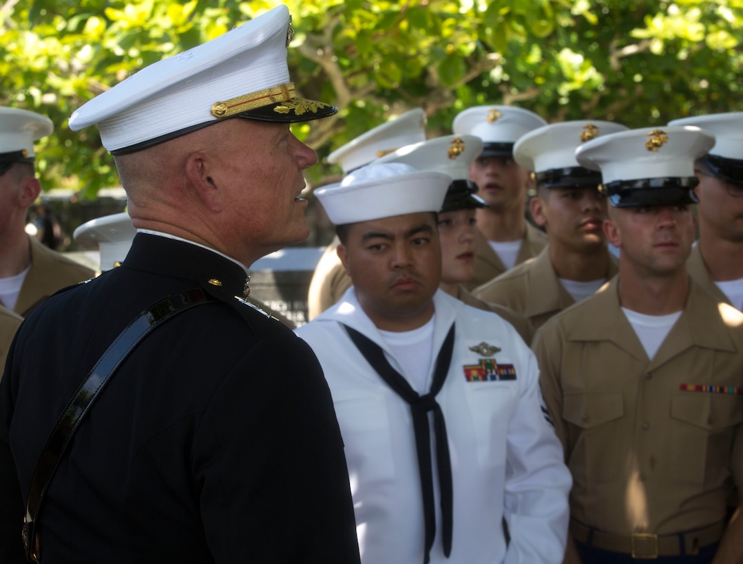 Lt. Gen. Lawrence D. Nicholson addresses attendees of the 2017 Okinawa Memorial Day services June 23, 2017, at Peace Memorial Park, Itoman, Japan. The ceremony brought together service members and Okinawan residents to honor those who lost their lives in the Battle of Okinawa. The memorial walls are inscribed with over 240,000 names of people who died, regardless of nationality, civilian or military status in the battle. During the ceremony, all who attended stood for a moment of silence honoring those who gave the ultimate sacrifice for their country. Nicholson is the Marine Forces Pacific commanding general and the Okinawa Area Coordinator. (U.S. Marine Corps photo by Lance Cpl. Charles Plouffe)