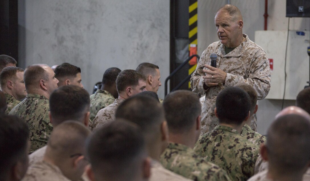 Commandant of the Marine Corps Gen. Robert B. Neller speaks to Marines with Special Purpose Marine Air Ground Task Force Crisis Response Central Command at Naval Support Activity, Manama, Bahrain, June 21, 2017. Neller visited to speak with Marines about the current state of the Corps and answer their questions. (U.S. Marine Corps photo by Cpl. Samantha K. Braun)