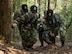 Cadets with the Civil Air Patrol European Encampment carry a stretcher bearing a fellow cadet through a woodland obstacle course on Ramstein Air Base, Germany, June 21, 2017. The cadets spent more than a week living in deployment tents on Ramstein, carrying out physical and mental tasks in a manner somewhat similar to Air Force Basic Training. (U.S. Air Force photo by Senior Airman Elizabeth Baker)