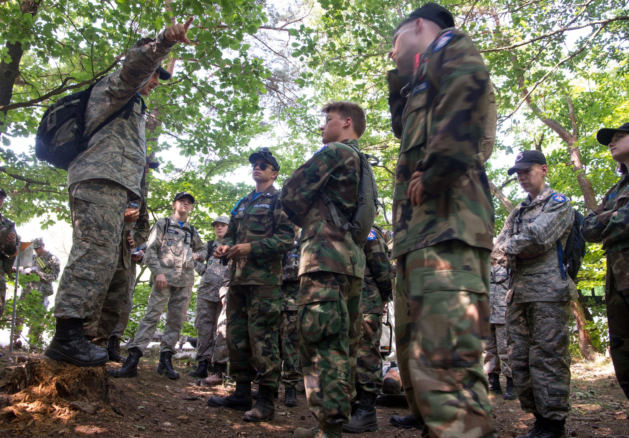 Civil Air Patrol Major Walter Brown, Royal Air Force Mildenhall Cadet Squadron deputy commander, instructs CAP European Encampment cadets on Ramstein Air Base, Germany, June 21, 2017. The cadets had many challenges to overcome from learning proper dress, drill and ceremony to figuring out how to communicate as they carried out challenges like the woodland obstacle course. These challenges are designed to transform American youth into leaders and build knowledge of aerospace throughout the U.S. population. (U.S. Air Force photo by Senior Airman Elizabeth Baker)
