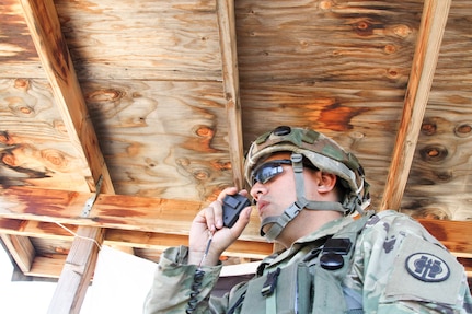 U.S. Army Reserve Spc. Antonio Garcia of the 341st Military Police Company, 200th Military Police Command, utilizes his radio to report enemy contact during WAREX 17-03 at Fort Hunter Liggett, CAlif. on June 19, 2017. More than 3000 U.S. Army Reserve soldiers are participating in the 84th Training Command's Warrior Exercise (WAREX) 19-17-03 at Fort Hunter Liggett, Calif.; the WAREX is a large-scale collective training platform to generate capable, lethal and combat ready forces. U.S. Army photo by Capt. Troy Preston.