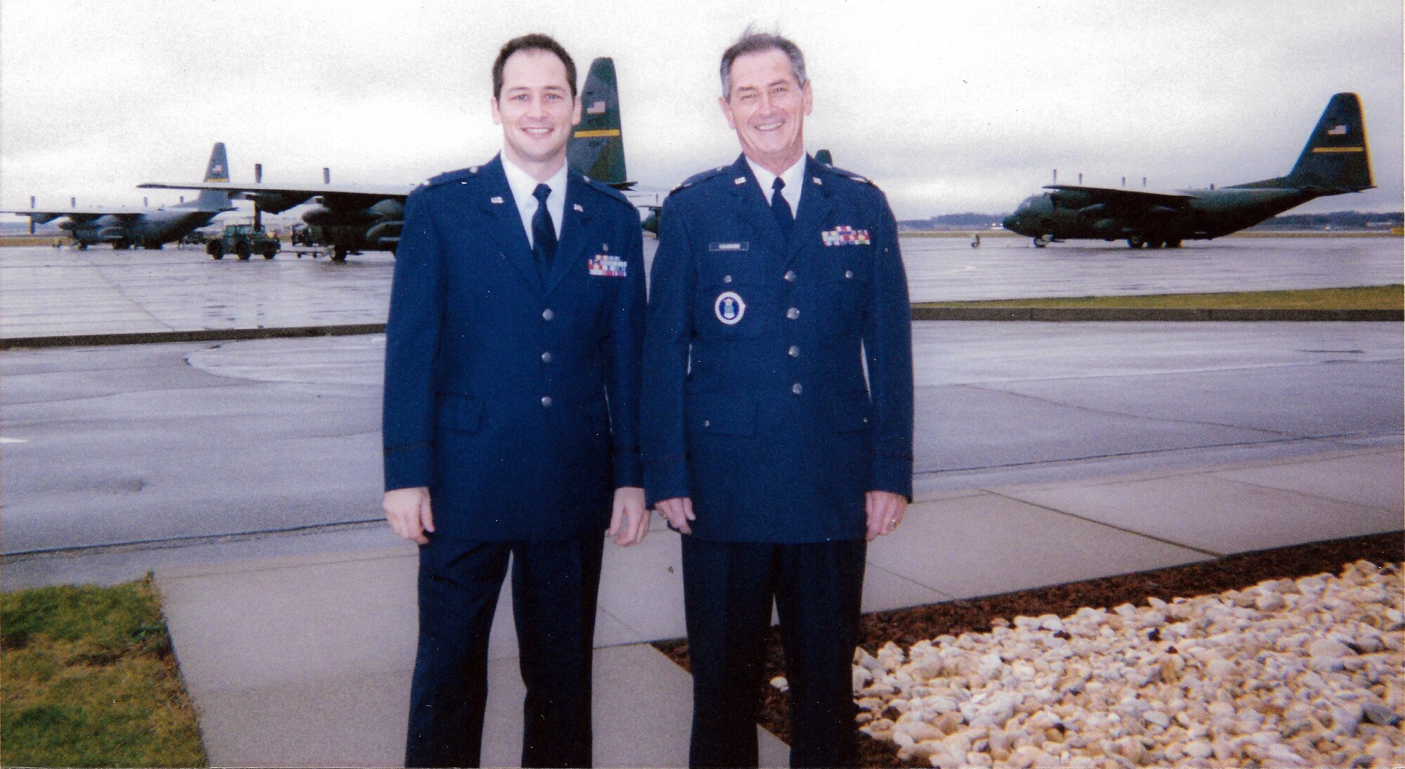 Then-1st Lt. Christopher Schumann stands with his father, retired Maj. George Schumann, as he prepares to take the commissioning oath and enter active-duty service once again in December 1999. Now-Lt. Col. Schumann began his career as an active-duty enlisted Airman, transitioned into the Air Force Reserve Command, then commissioned twice: first as a Reserve officer, then back into active-duty service. (Courtesy photo)