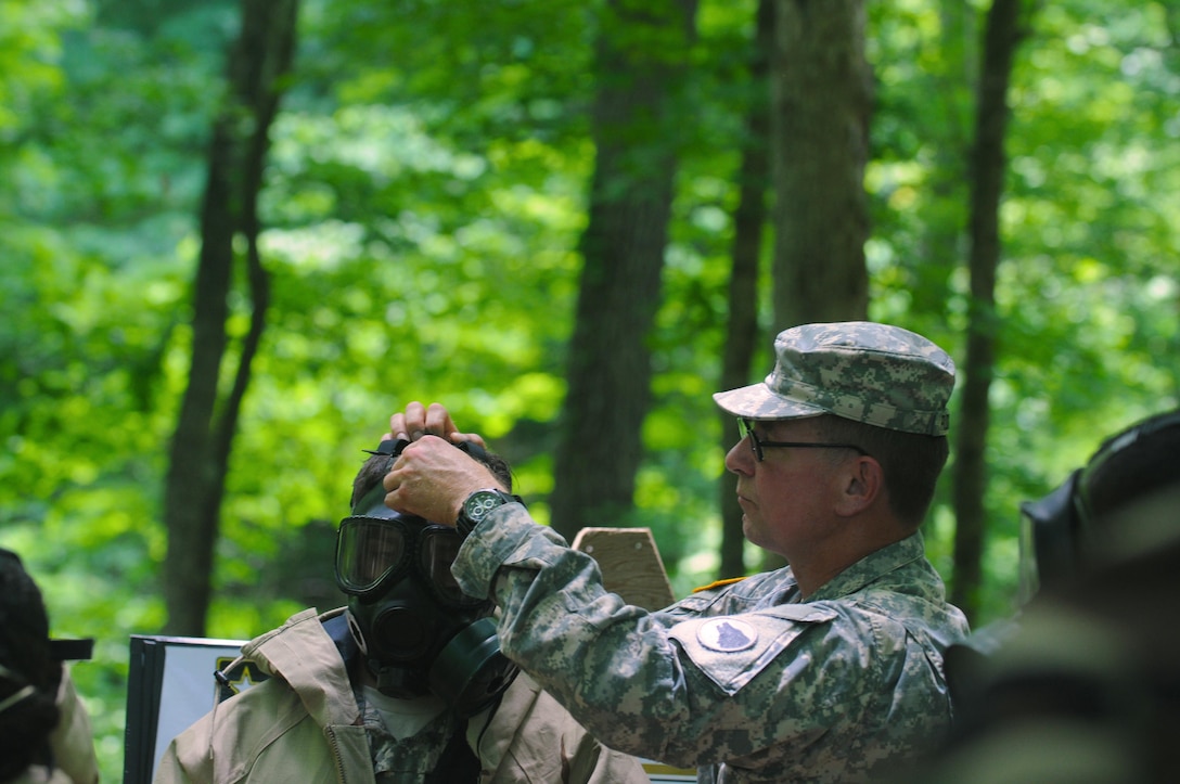 Staff Sgt. Steven Rudometkin, assigned to Task Force Wolf, checks the seal on a gas mask worn by a Cadet prior to entering the gas chamber at Fort Knox, Ky. June 4, 2017. The Army Reserve has increased its role in officer accessions training across all components of the Army­ Active Duty, Reserve and National Guard in order to meet the future demand for leaders.  America’s Army Reserve generates combat ready units and Soldiers for the Army and Joint Warfighter that are trained, equipped, and lethal to win our Nation's wars.