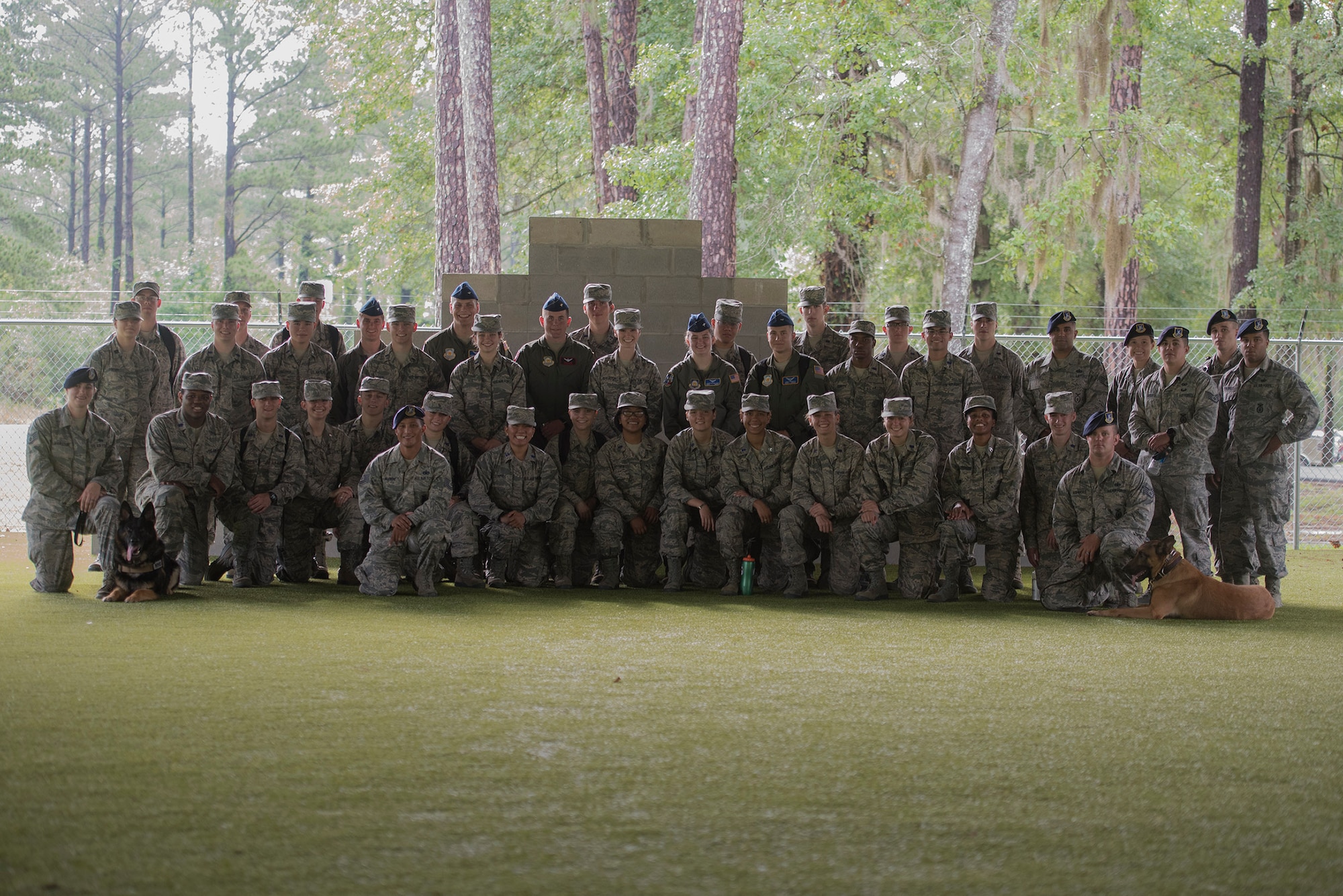 Air Force Reserve Officers’ Training Corps cadets from across the nation pose with members of the 23d Security Forces Squadron during Operation Air Force 2017, June 14, 2017, at Moody Air Force Base, Ga. The annual event is designed to give cadets a hands-on training experience and a glance at various mission assets at bases across the world. The program allows cadets to confirm or reassess their pursued career fields while learning different support functions to become better leaders of Airmen in the future. (U.S. Air Force photo by Senior Airman Greg Nash) 