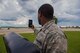 Cadet Tim Bradshaw, The Wright State University Detachment 643, takes a photo of Moody’s flight line during Operation Air Force 2017, June 14, 2017, at Moody Air Force Base, Ga. The annual event is designed to give cadets a hands-on training experience and a glance at various mission assets at bases across the world. The program allows cadets to confirm or reassess their pursued career fields while learning different support functions to become better leaders of Airmen in the future. (U.S. Air Force photo by Senior Airman Greg Nash)