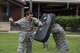 Cadet Sean Murphy, University of Miami Detachment 155, swings a baton during combative training as part of Operation Air Force, June 14, 2017, at Moody Air Force Base, Ga. The annual event is designed to give cadets a hands-on training experience and a glance at various mission assets at bases across the world. The program allows cadets to confirm or reassess their pursued career fields while learning different support functions to become better leaders of Airmen in the future. (U.S. Air Force photo by Senior Airman Greg Nash)