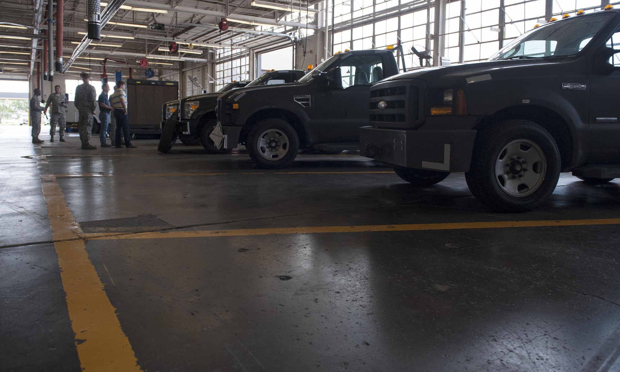 Flightline tow tractors, also known as bobtail vehicles, await inspection from Robins Air Force Base engineers at Dyess AFB, Texas, June 14, 2017. The engineers examined the difference between the models with and without the new I-beam modification to gain more knowledge of the modification to begin the approval and funding process. (U.S. Air Force photo by Airman 1st Class April Lancto)
