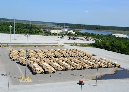 Mine-Resistant Ambush Protected vehicles are prepared to be on-loaded onto the Liberty Maritime Corporation’s ship Liberty Passion at Joint Base Charleston, S.C., June 15, 2017. Members from the 841st Transportation Battalion staged, processed and configured the equipment in support of Marine Corps pre-positioning and staging across Europe and Asia. The 841st TB conducts surface distribution and port clearance operations in support of Geographic Combatant Commanders and deployment readiness.