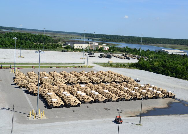 Mine-Resistant Ambush Protected vehicles are prepared to be on-loaded onto the Liberty Maritime Corporation’s ship Liberty Passion at Joint Base Charleston, S.C., June 15, 2017. Members from the 841st Transportation Battalion staged, processed and configured the equipment in support of Marine Corps pre-positioning and staging across Europe and Asia. The 841st TB conducts surface distribution and port clearance operations in support of Geographic Combatant Commanders and deployment readiness.