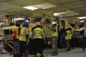 Civilians and U.S. Army Soldiers assigned to the 841st Transportation Battalion on-load Mine-Resistant Ambush Protected vehicles onto the Liberty Maritime Corporation’s ship Liberty Passion at Joint Base Charleston, S.C., June 15, 2017. Members from the 841st TB staged, processed and configured the equipment in support of Marine Corps pre-positioning and staging across Europe and Asia. The 841st TB conducts surface distribution and port clearance operations in support of Geographic Combatant Commanders and deployment readiness.
