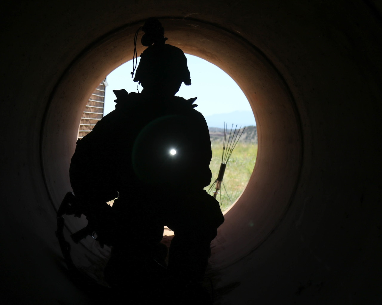 Army Sgt. Stephen Moreno, an explosive ordnance disposal specialist with the 797th Ordnance Company, searches a tunnel for booby traps at Fort Carson, Colo., June 14, 2017. Army photo by Spc. Anthony Bryant