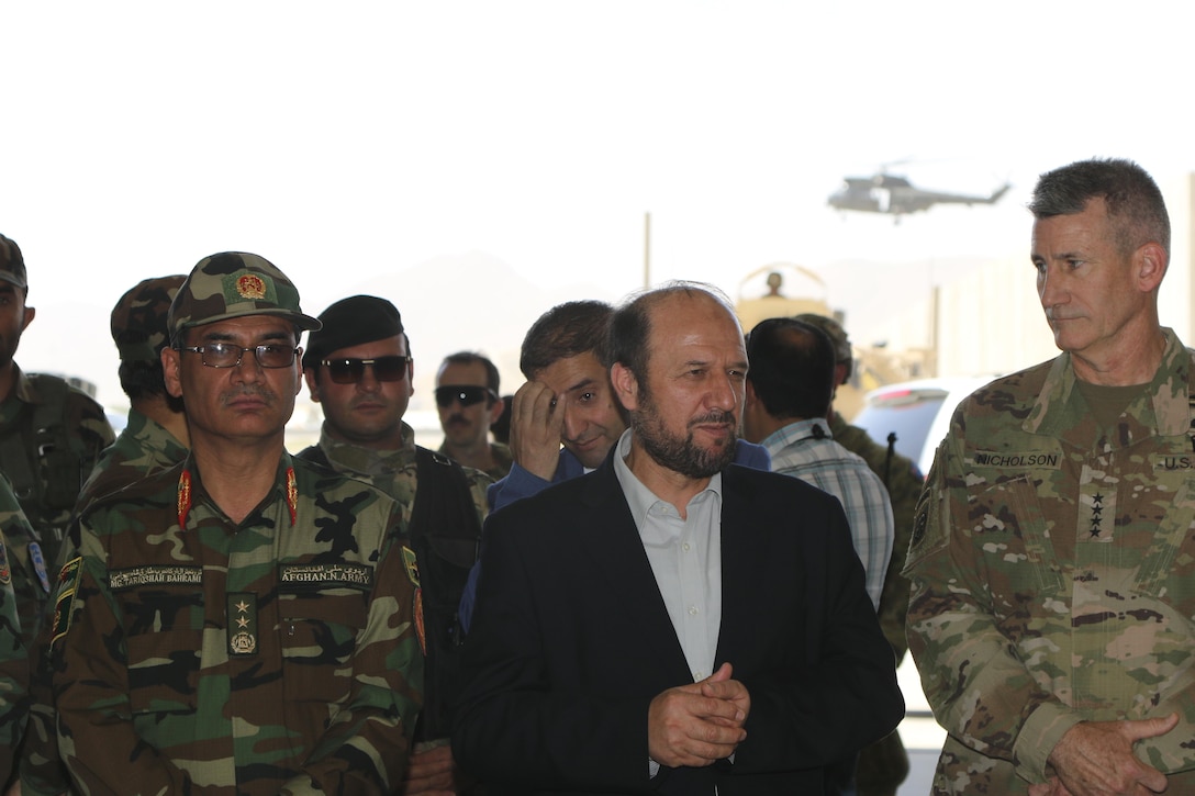 KABUL, Afghanistan (June 22, 2017) — Gen. John Nicholson, Resolute Support commander, visits Train, Advise, Assist Command – Air to assess the impact and progress of the AAF in the war against terrorism. Minister of Defense Maj. Gen. Tariq Shah Bahrami and the Minister of Interior Taj Muhammad Jahid were also present during the briefing and tour of the AAF aircrafts.

The Afghan Airforce is set to expand, helping to provide the foundation and an enduring mechanism for superior power projection for the Afghan government. Their airpower includes the Mi-17 (for air transport of troops and cargo, medical evacuations, and attack), the A-29 (a strike aircraft), the MD-530 (a small attack helicopter), the C-130 (airlift), and the C-208 (airlift with airdrop capability), explained German Lt. Col. Nikolaus Nanasi, MoD Air Advisor. 

The AAF is projected to expand and will include new capabilities such as the AC-208, an aircraft which, for the first time, will provide the AAF an organic intelligence surveillance reconnaissance asset. Also, they will be empowered with 159 new UH-60 Blackhawks and additional A-29s and MD-530s.