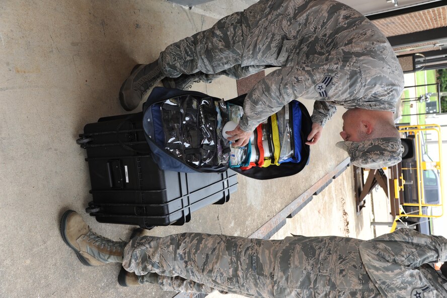 Senior Airman Kevin Morgan, 14th Medical Operations Squadron Bioenvironmental Technician, digs through a Quicksilver Kit June 20, 2017, at Columbus Air Force Base, Mississippi. The kit contains multiple ways to test air, water and soil for hazardous materials. (U.S. Air Force photo by Airman 1st Class Beaux Hebert)