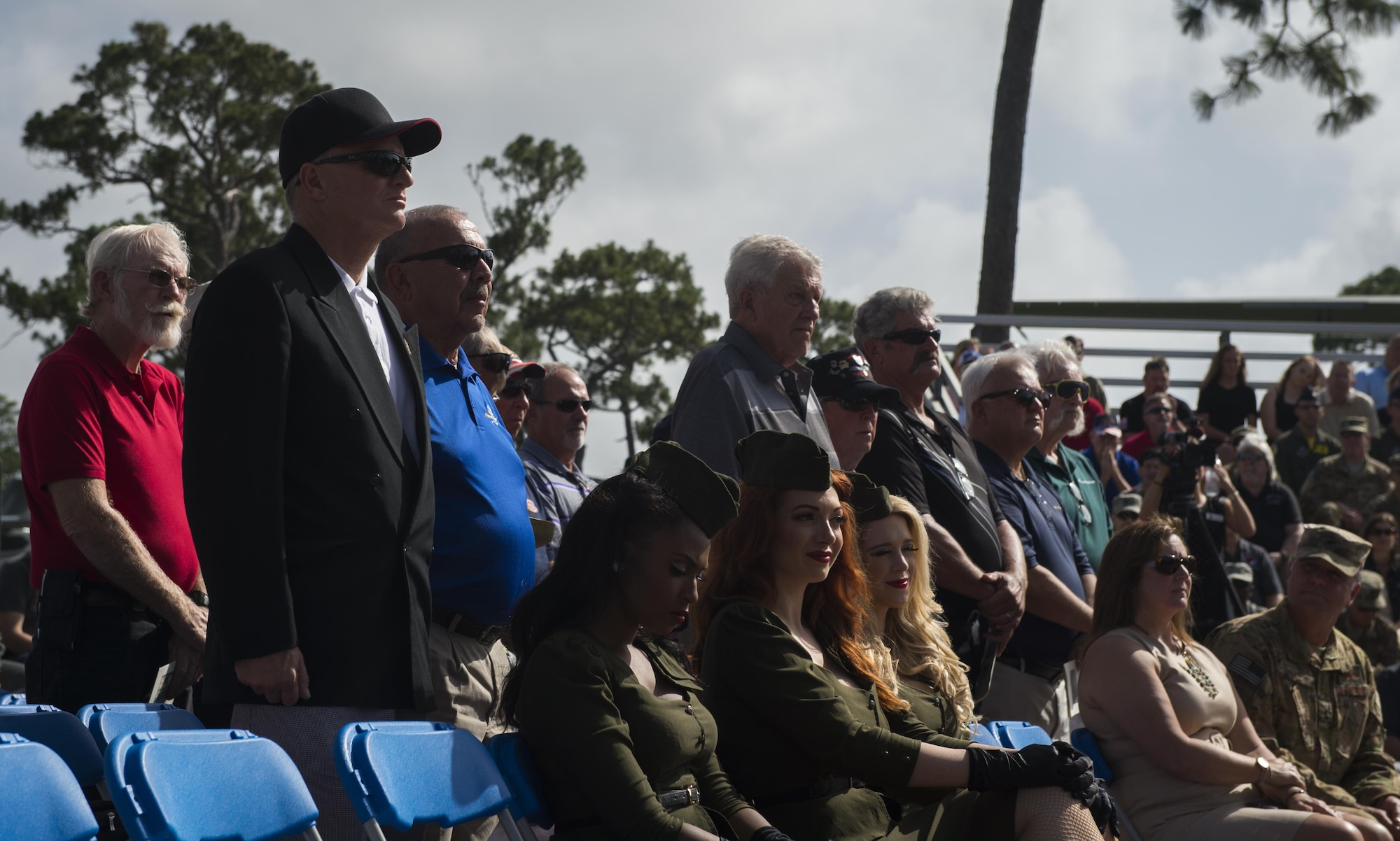 Veterans of Operation Eagle Claw stand as they are recognized during a memorial ceremony at Hurlburt Field, Fla., June 23, 2017. Operation Eagle Claw was an attempted rescue mission on April 24, 1980, into Iran to liberate more than 50 American hostages captured after a group of radicals took over the American embassy in Tehran, Nov. 4, 1979. (U.S. Air Force photo by Airman 1st Class Joseph Pick)