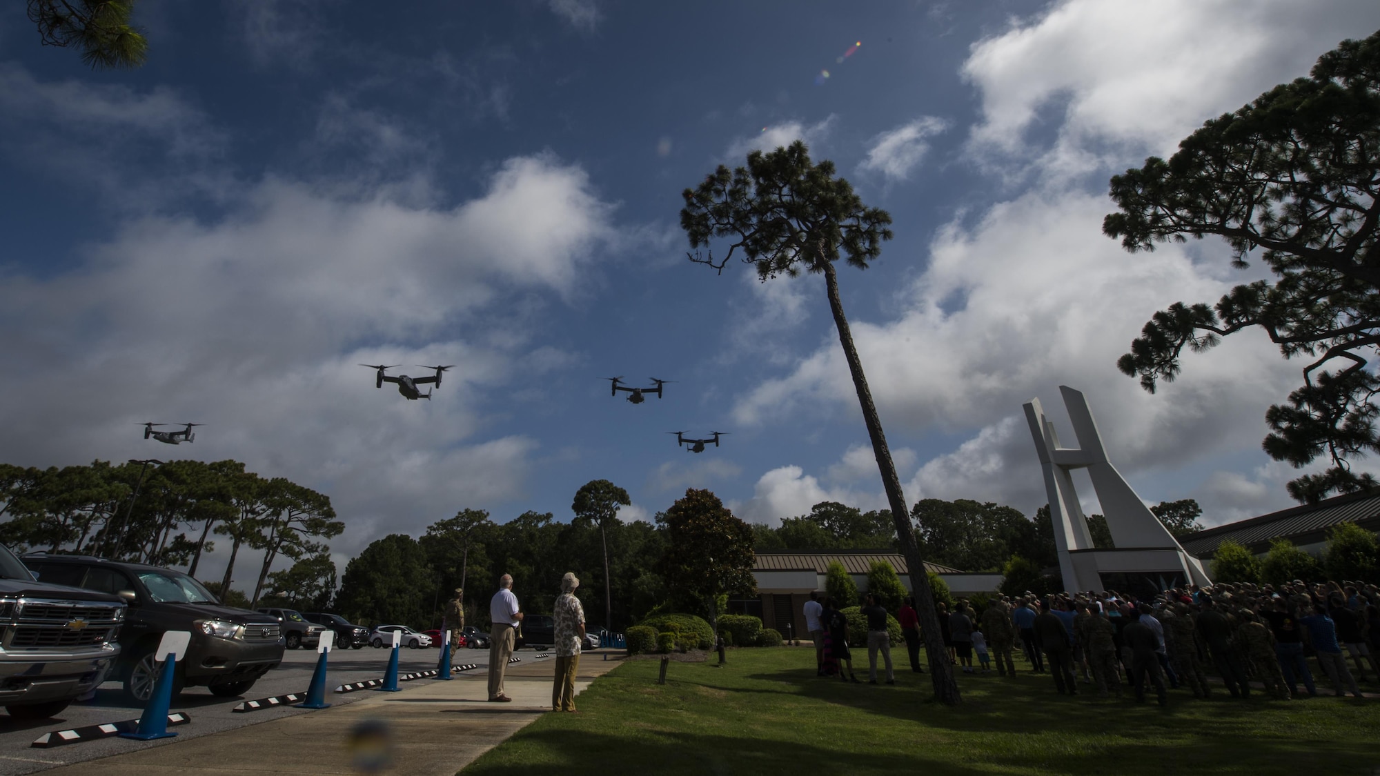Four CV-22 Osprey tiltrotor aircraft from the 8th Special Operations Squadron fly over during the Operation Eagle Claw memorial ceremony at Hurlburt Field, Fla., June 23, 2017. Operation Eagle Claw was an attempted rescue mission on April 24, 1980, into Iran to liberate more than 50 American hostages captured after a group of radicals took over the American embassy in Tehran, Nov. 4, 1979. (U.S. Air Force photo by Airman 1st Class Joseph Pick)