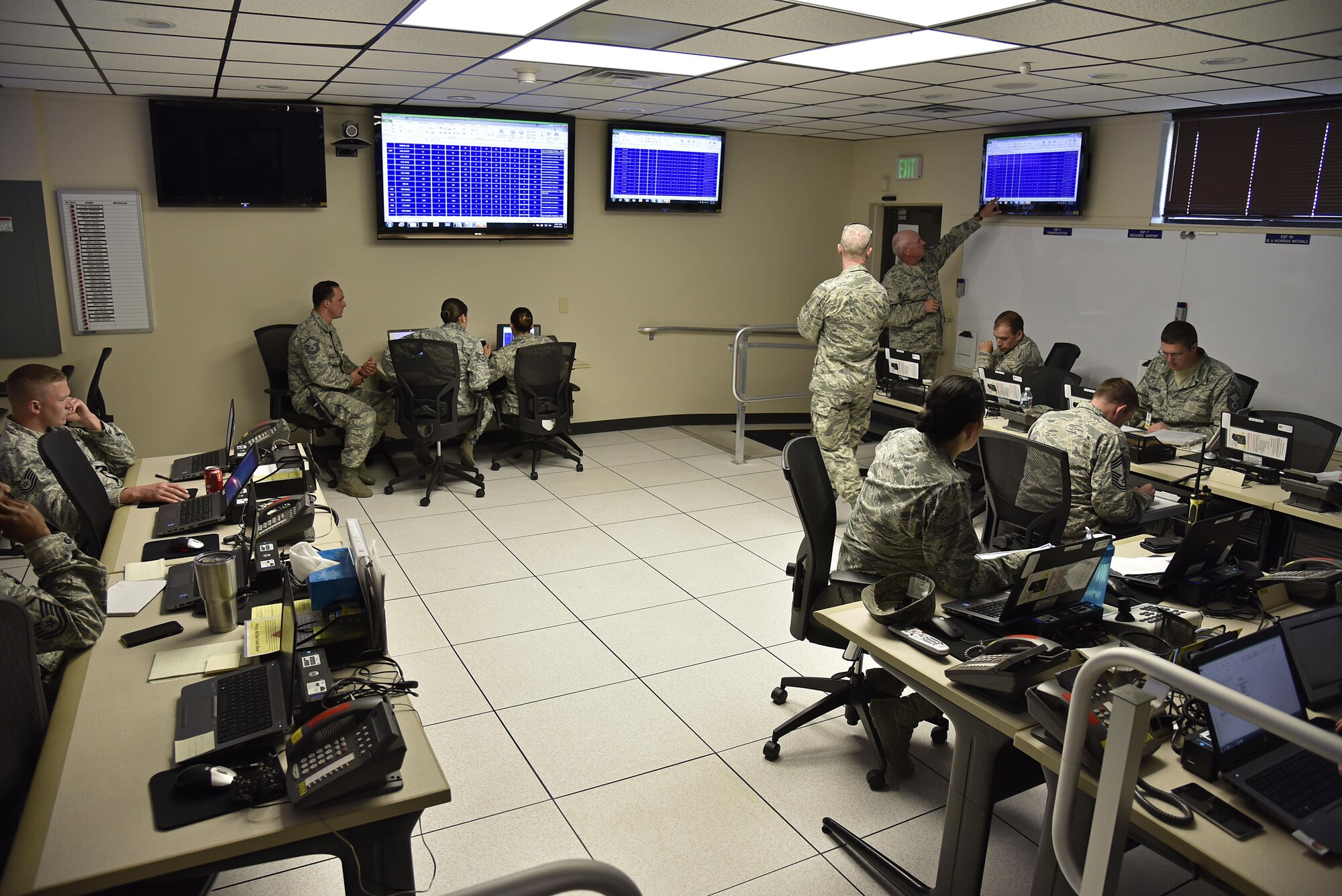 Service members work to take full accountability of 175th Wing Airmen June 22, 2017, in the emergency operations center at Warfield Air National Guard Base, Middle River, Md. The members were participating in Warfield’s first active shooter training exercise this year. (U.S. Air National Guard photo by Airman Sarah M. McClanahan)