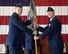 Col. Stan Lawrie, 14th Operations Group Commander, passes the 49th Fighter Training Squadron Guidon to Lt. Col. John Macasek, the new 49th FTS Commander, June 16, 2017, at Columbus Air Force Base, Mississippi. The passing of the guidon has been a military tradition dating back to ancient times. The troops of the old commander would assemble and salute him one last time, then the new commander would receive the guidon, symbolizing he is taking charge of the troops, and the troops would then welcome the new commander. (U.S. Air Force photo by Melissa Doublin)