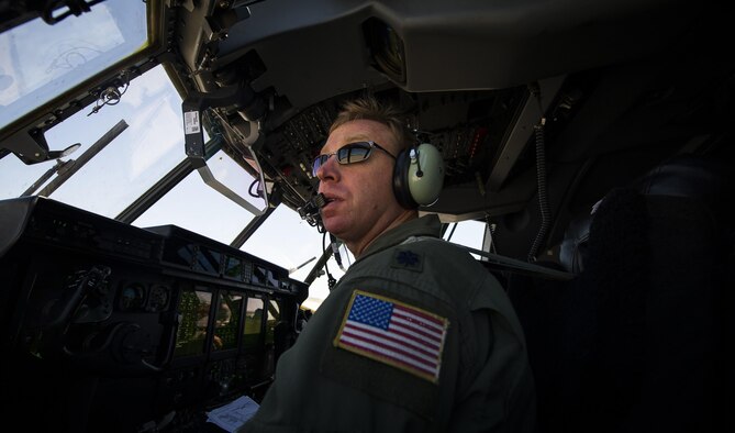 Lt. Col. Richard Hollinger, former 9th Special Operations Squadron assistant director of operations, pilots his aircraft during his ‘fini flight’ at Cannon Air Force Base, New Mexico, Jun. 9, 2017. Dating back to World War II, the U.S. military has celebrated pilots’ and other experienced officers’ final flights either at their current unit or their career. Pilots use these celebrations as another opportunity to help train accompanying Airmen on their roles aboard the aircraft to ensure mission readiness. (U.S. Air Force photo by Senior Airman Lane T. Plummer)