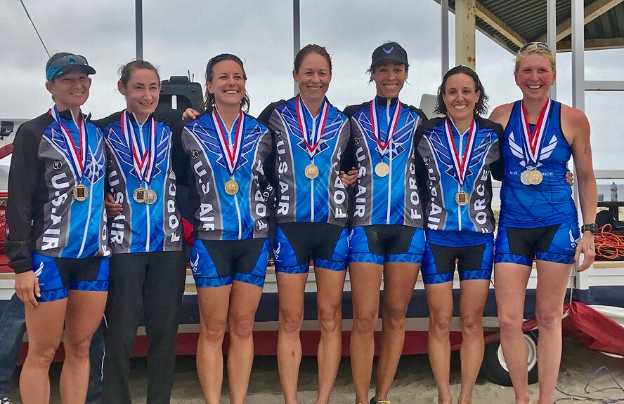 Maj. Jamie Turner, a Reserve pilot in the 317th Airlift Squadron (center)Stand with her Air Force Teammates after completing the Armed Forces Triathlon Championship, June 10, in Point Mugu, California. She finished 2nd in the Air Force, 5th overall and 2nd in the Masters category (over 35-years-old category). The Air Force women’s team took home the gold medal, and the men took silver. (Courtesy Photo)
