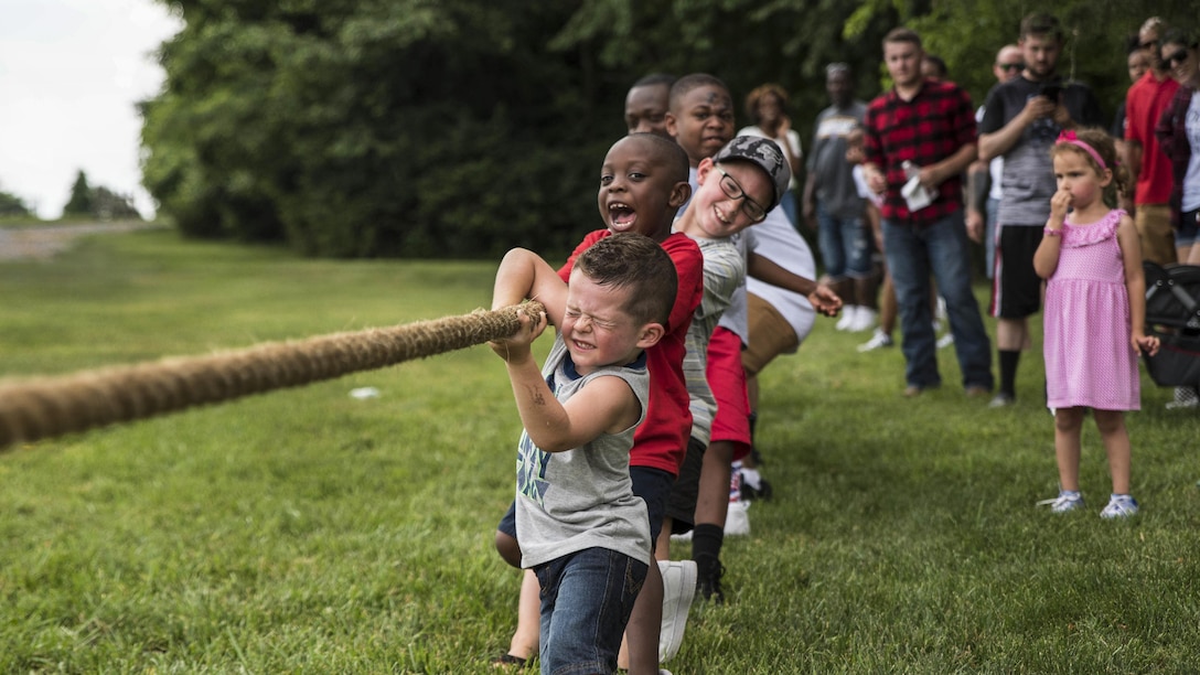 Children of Naval Support Activity Bethesda personnel compete in tug of war in Clarksburg, Md., June 17, 2017, during the activity’s first command picnic. Navy photo by Petty Officer 2nd Class William Phillips