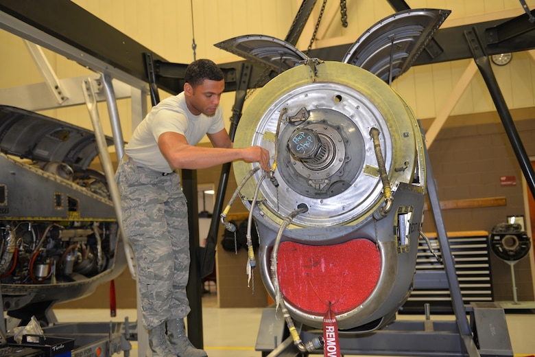 Staff Sgt. Kevin Philitas, 361st Training Squadron Aerospace and Propulsion course student adjusts the torque meter and the anti-icing shroud on a T-56 engine at Sheppard Air Force Base, Texas. (U.S. Air Force photo by Liz H. Colunga/Released)