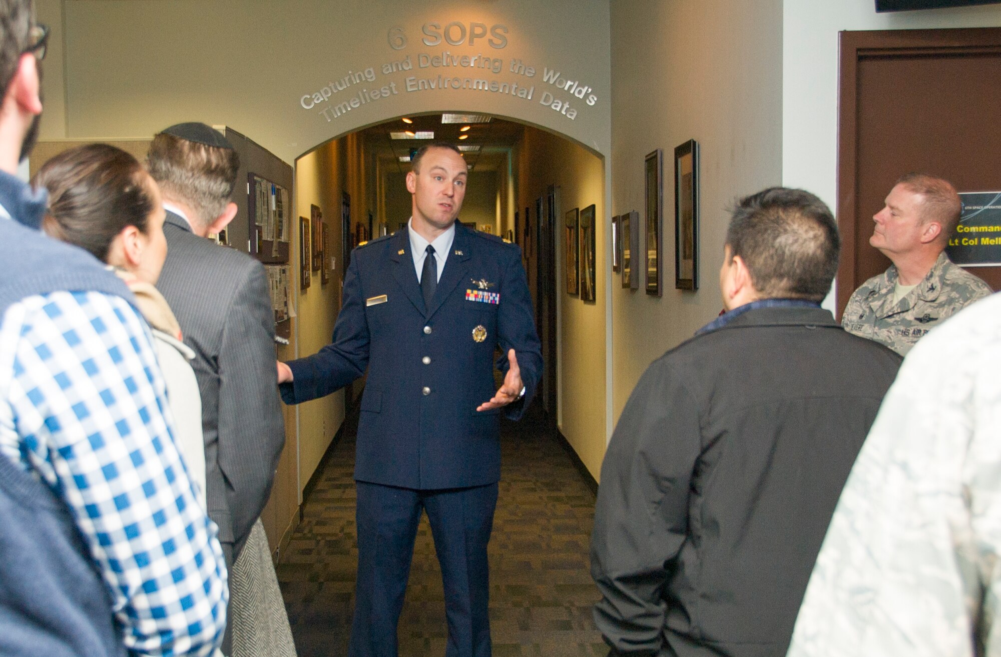 Maj. Joshua Friedman, a 6th Space Operations Squadron mission assurance officer, speaks to Colorado Springs community leaders participating in the 302nd Airlift Wing’s Partners in Leadership Program during a tour of the Air Force Reserve Command’s 310th Space Wing at Schriever Air Force Base, Colo., May 18, 2017. The visit to the 310th SW marks the second of four planned events with Air Force Reserve units. The Partners in Leadership program aims to provide educational experiences to community leaders on Air Force Reserve missions performed in the Pikes Peak region.  (U.S. Air Force photo/Senior Airman Laura Turner) 