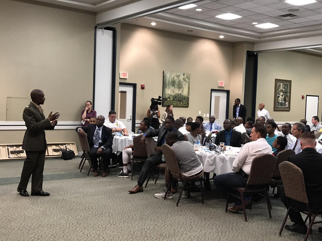 Col. James C. Carroll III, commanding officer, Marine Corps Logistics Base Albany,  served as the keynote speaker for the 5th annual “Ties that Bind.” The mentoring event teaches young boys to tie a necktie while forming bonds with some of the community’s most distinguished leaders at the Phoebe Northwest Conference Center in Albany, Ga., June 15.  The annual event, hosted by Phoebe Putney Memorial Hospital’s Network of Trust School Health Program, selects 50 boys, mostly from homes without fathers, and pairs them with 50 local men.  