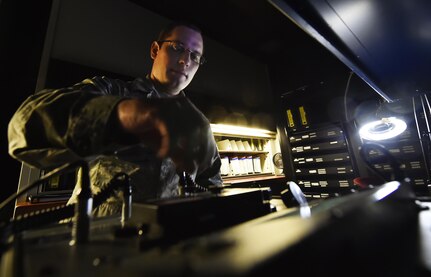 Staff Sgt. Brian Spears, 437th Operation Support Squadron aircrew flight equipment NCO in charge of night vision goggle combat survival evader locaters, inspects the integrity of an NVG at Joint Base Charleston, S.C., June 20. Airmen assigned to the 437th OSS AFE flight ensure that aircrew equipment including helmets, oxygen masks, life rafts, and parachutes are safe and ready to operate. 