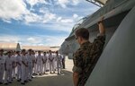 U.S. Marine Corps Capt. Michael M. Rasmussen, assistant operations chief with Marine Air Group (MAG) 12, shows Japan Maritime Self-Defense Force aviation students an F/A-18C Hornet during a Junior Officer Exchange Program visit at Marine Corps Air Station Iwakuni, Japan, June 21, 2017. Students came from Ozuki Air Base to learn about MAG-12 and the F/A-18. They familiarized themselves with the aircraft during the visit by taking part in a flight simulator and by visiting a static display. Hosting the cadets helps them understand the relationship Japan holds with U.S. Marines. 