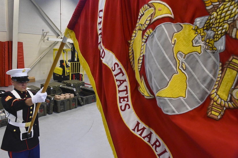 U.S. Marine Corps Staff Sgt. Robert Swift, Combat Logistics Battalion 451 Detachment 3 distribution management officer chief, presents the Marine Corps flag during an Honor Guard practice session at Joint Base Charleston - Weapons Station, S.C., June 21. The unit’s main priority is to provide funeral honors for any members who have honorably served in the U.S. Marine Corps within a 200-mile radius of the base.  